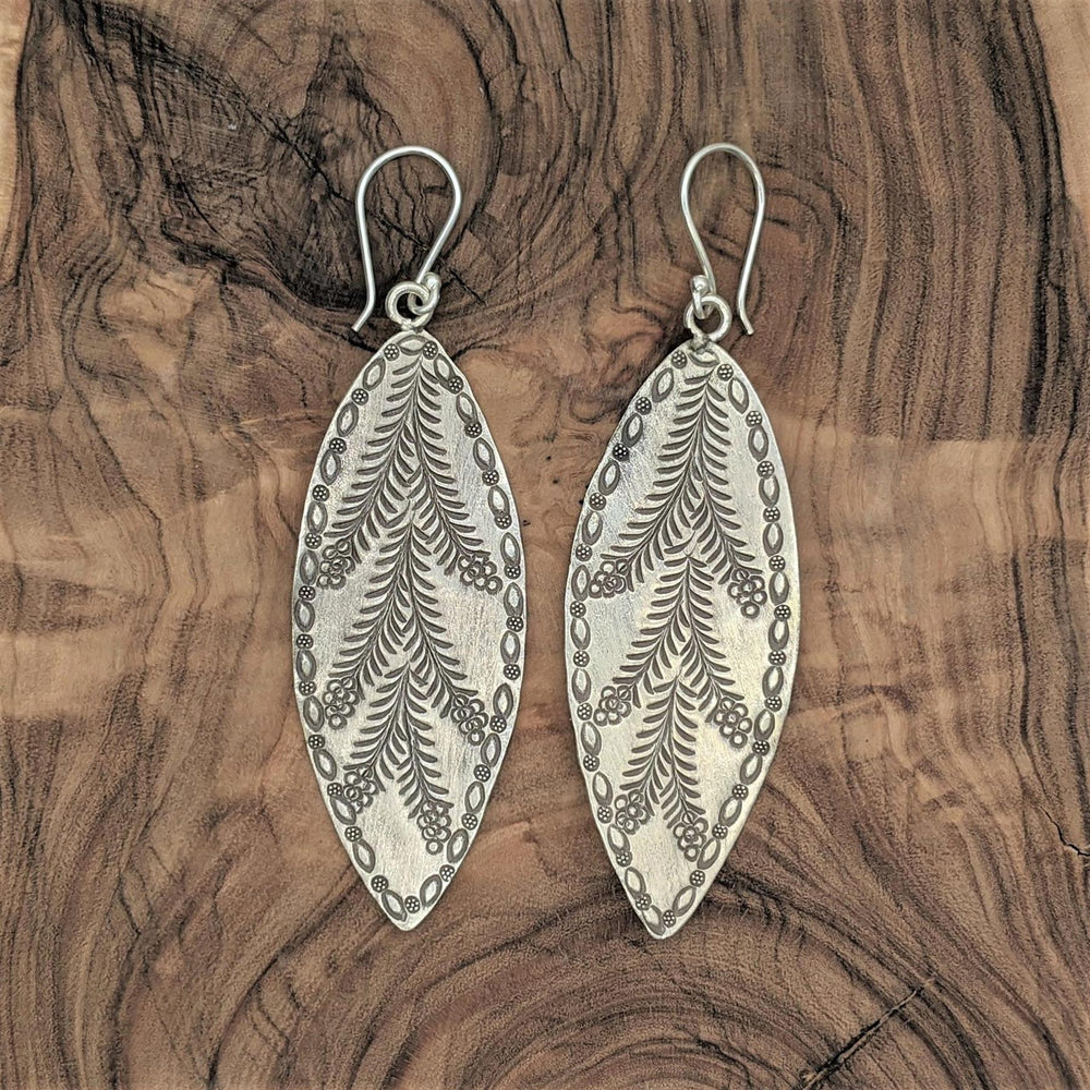 
                  
                    Karen Hill Tribe Silver Leaf Shaped Flower Motif Dangle Earrings
                  
                