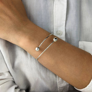 
                  
                    Sterling Silver Double Ball Overlapping Wrap Thin Adjustable Bangle
                  
                