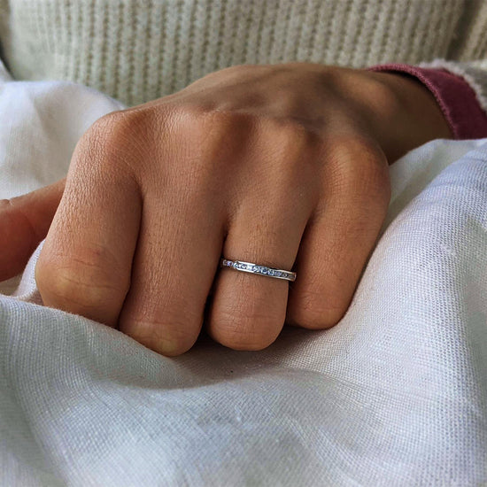 
                    
                      Sterling silver 3mm CZ eternity band — sparkling flat-edge stacking ring
                    
                  