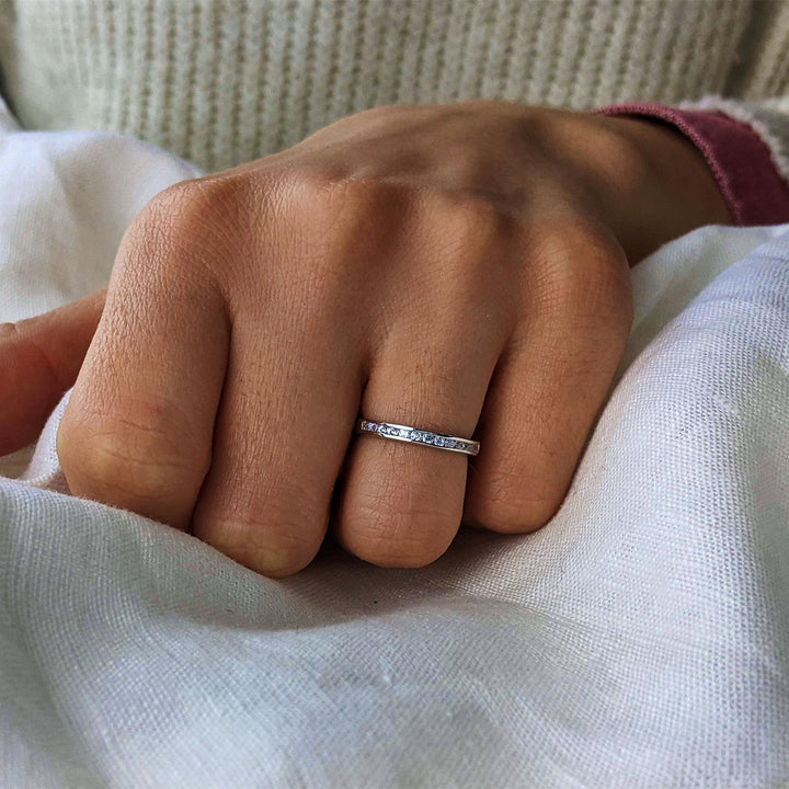 Sterling silver 3mm CZ eternity band — sparkling flat-edge stacking ring