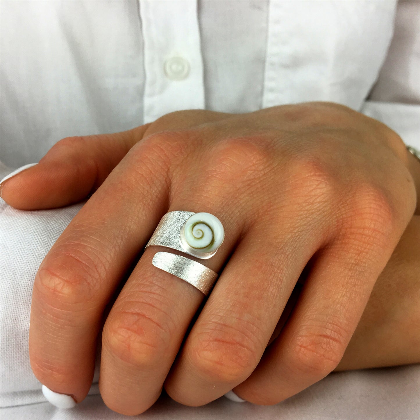 
                  
                    Sterling Silver Satin Finish Wide Shiva Eye Shell Adjustable Wrap Ring
                  
                