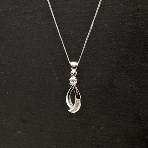 
                  
                    Sterling Silver Cubic Zirconia Infinity Ribbon Drop Pendant Necklace
                  
                