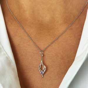 
                  
                    Sterling Silver Purple Cubic Zirconia Celtic Reef Knot Pendant Necklace
                  
                
