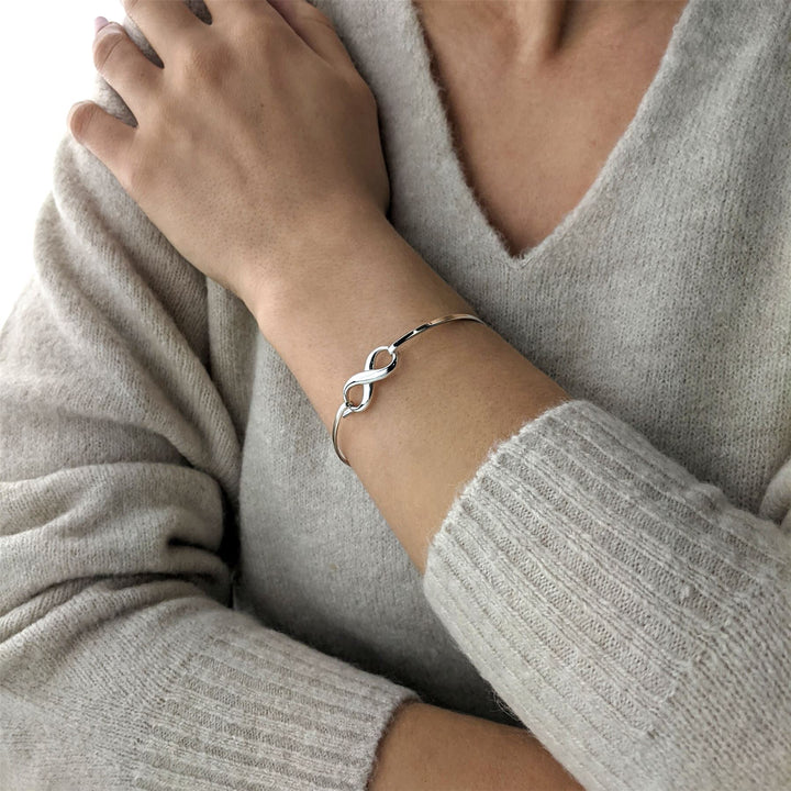 Sterling silver infinity bangle with hook clasp