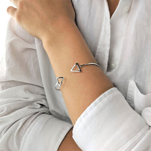 
                  
                    Sterling Silver Geometric Double Arrow Adjustable Torque Bangle
                  
                