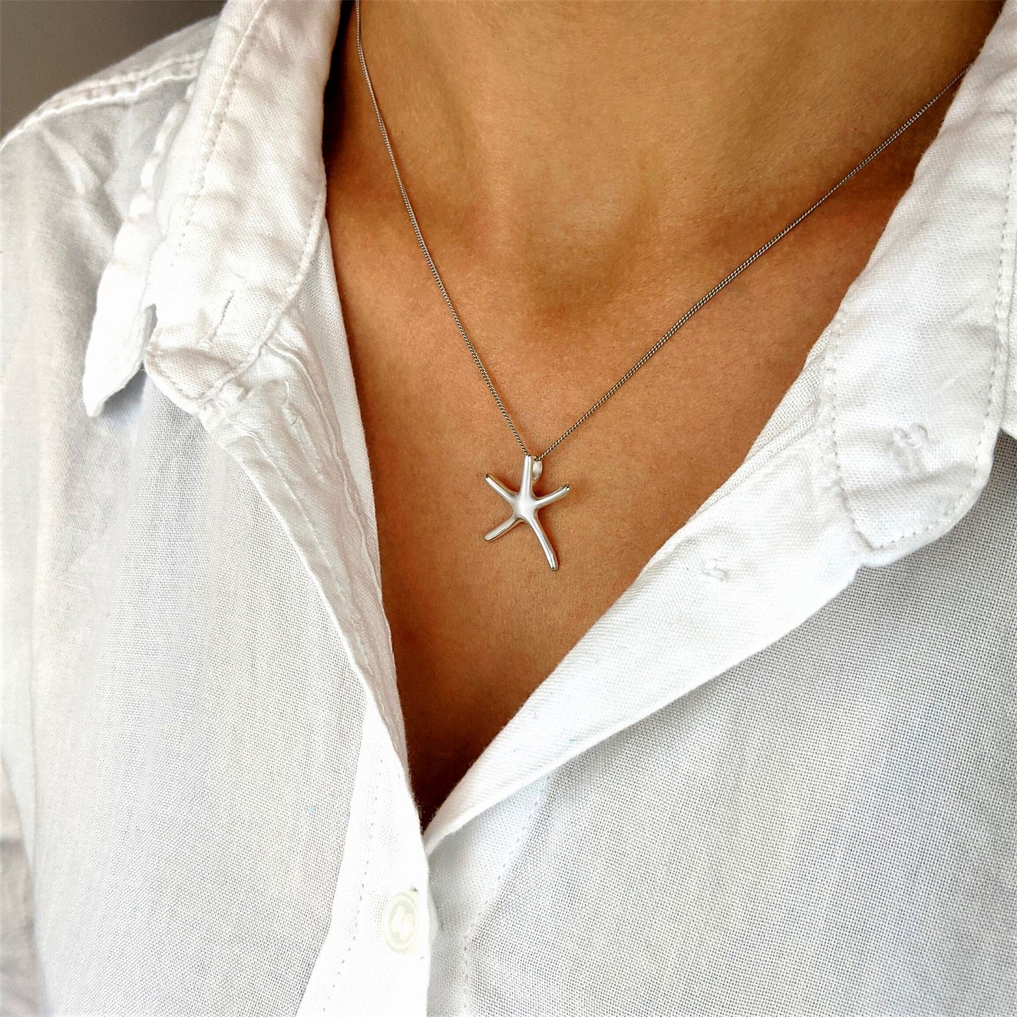 
                  
                    Sterling Silver Simple Starfish Pendant Necklace With Curb Chain
                  
                