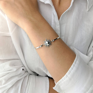 
                  
                    Sterling Silver Thin Elegant Blazing Sun Bangle With Hook Clasp
                  
                