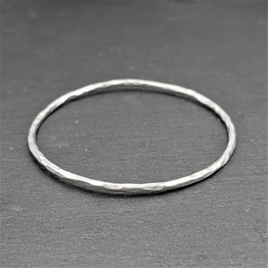 
                  
                    Karen Hill Tribe Silver Minimalist Hammered Tube Stackable Bangle
                  
                