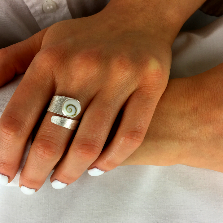 Close-up of genuine Shiva Eye shell centrepiece on sterling silver wrap ring