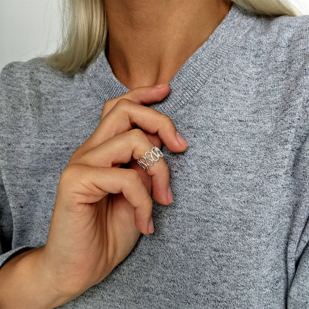 
                  
                    Sterling Silver Wavy Swirl Adjustable Midi Finger Pinky Toe Ring
                  
                