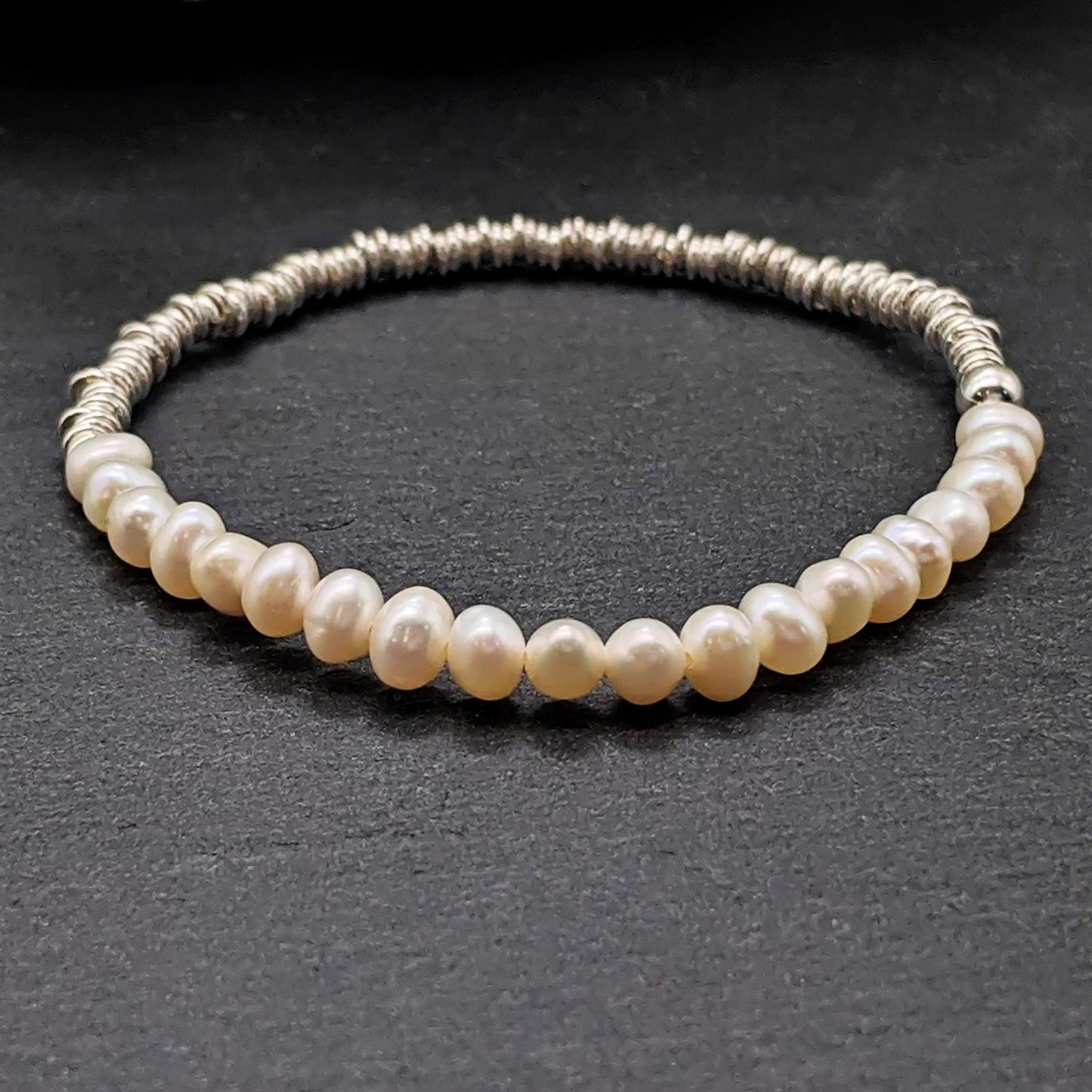 
                  
                    Sterling Silver Raw Natural Freshwater Pearl Stretch Beaded Bracelet
                  
                