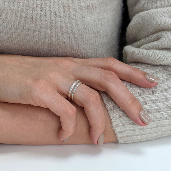 Side view of 925 sterling silver CZ band ring — illusion of two stacked bands