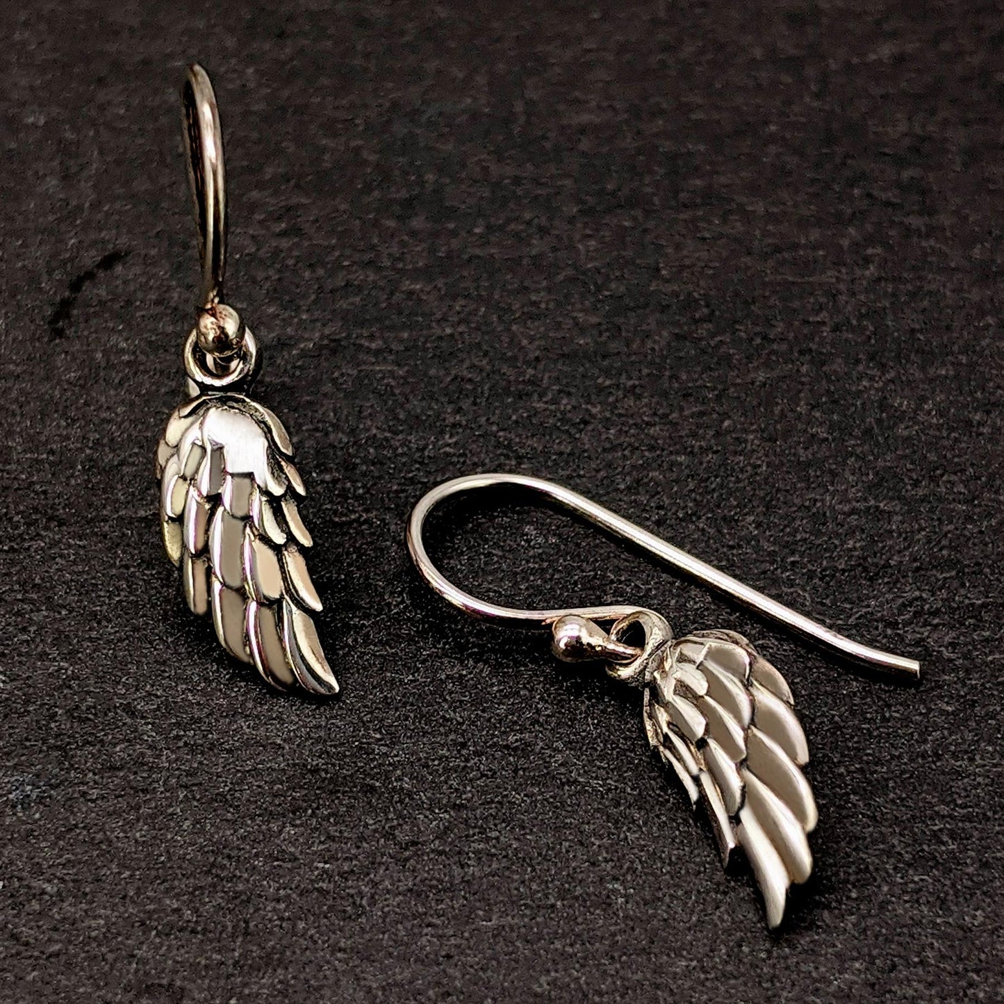 
                  
                    Sterling Silver Small Detailed Angel Wing Feather Drop Earrings
                  
                