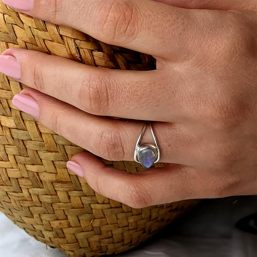 
                  
                    Sterling Silver Pear Shaped Moonstone Lasso Knot Band Birthstone Ring
                  
                