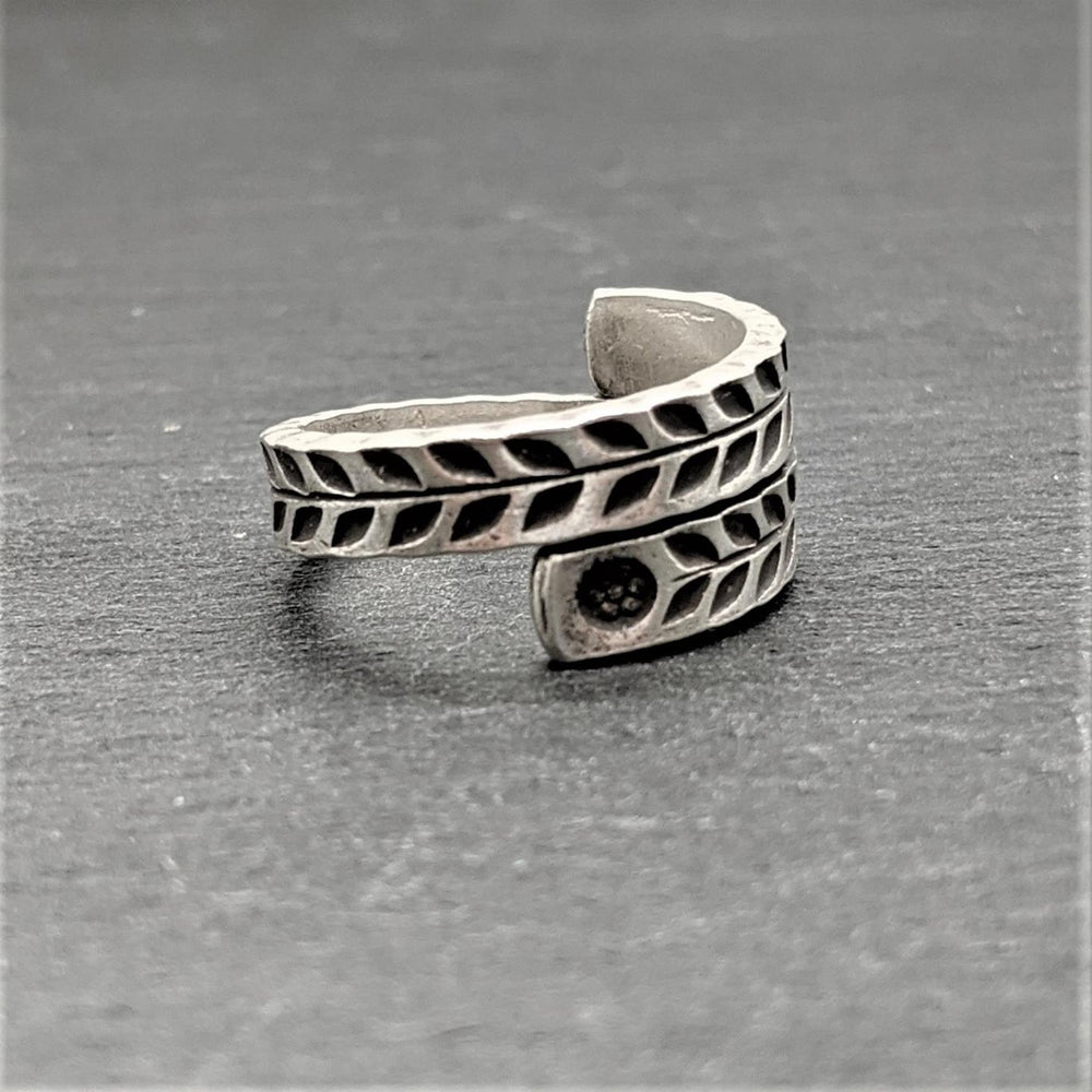 
                  
                    Karen Hill Tribe Silver Ring Overlapping Engraved Leaf Sun Motif
                  
                