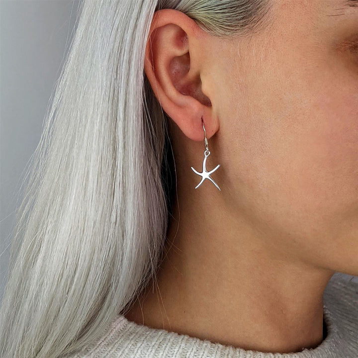 Sterling silver starfish drop earrings — beach-inspired ocean jewellery
