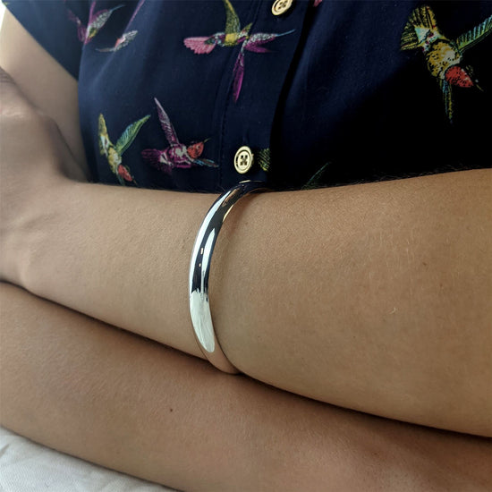 
                    
                      Chunky sterling silver D-shape bangle
                    
                  