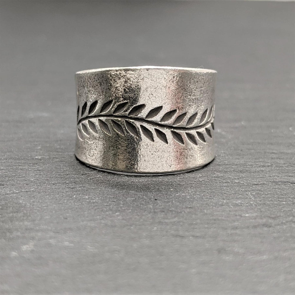 
                  
                    Karen Hill Tribe Silver Wide Engraved Leaf Vine Adjustable Ring
                  
                