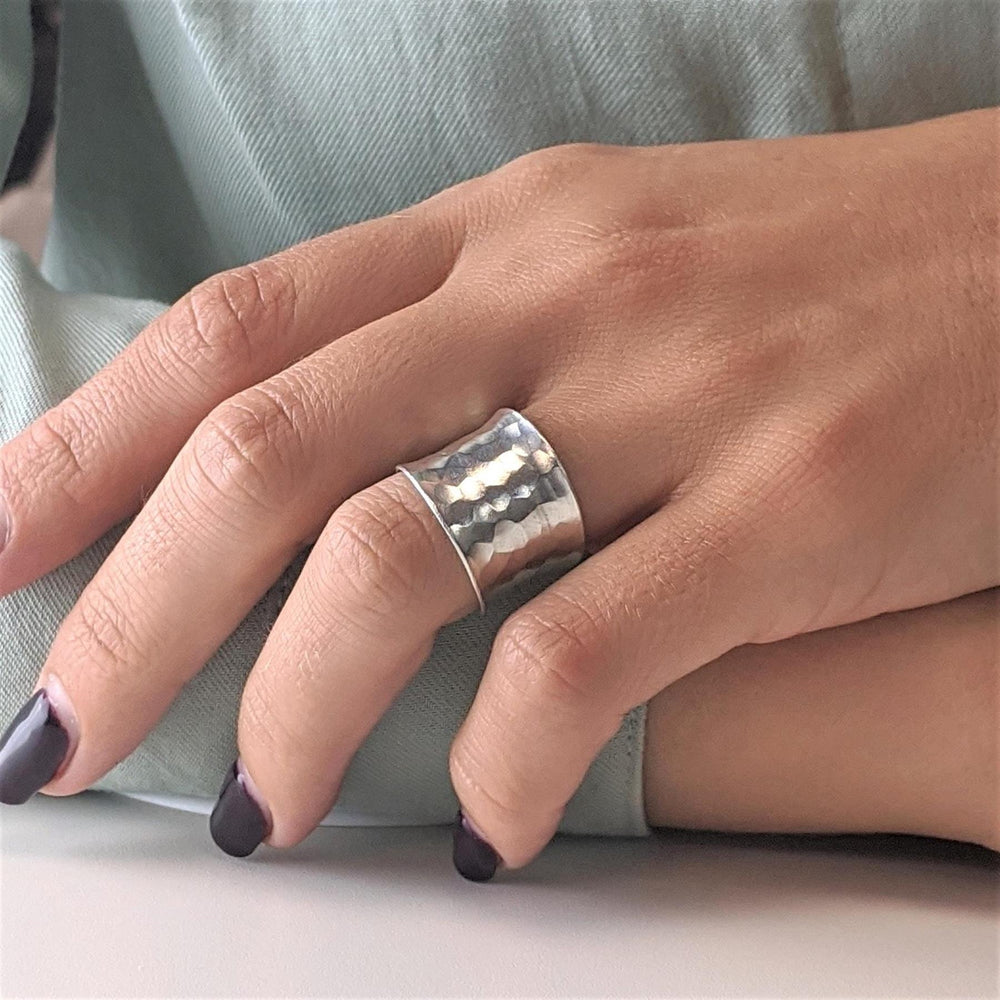 
                  
                    Hill Tribe Silver Wide Hammered Adjustable Ring Thumb & Fingers
                  
                