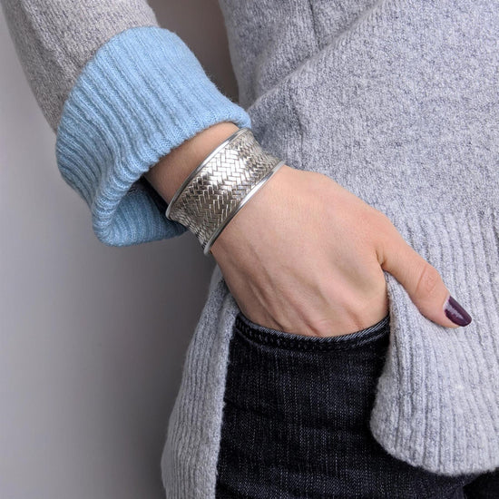 
                    
                      Karen Hill Tribe silver bangle with woven basketweave design
                    
                  